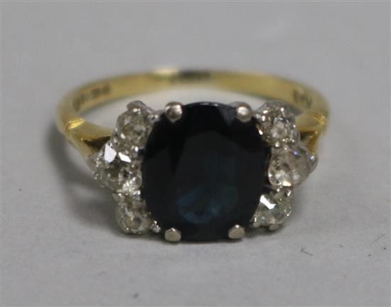 An 18ct gold, sapphire and diamond dress ring, size J.
